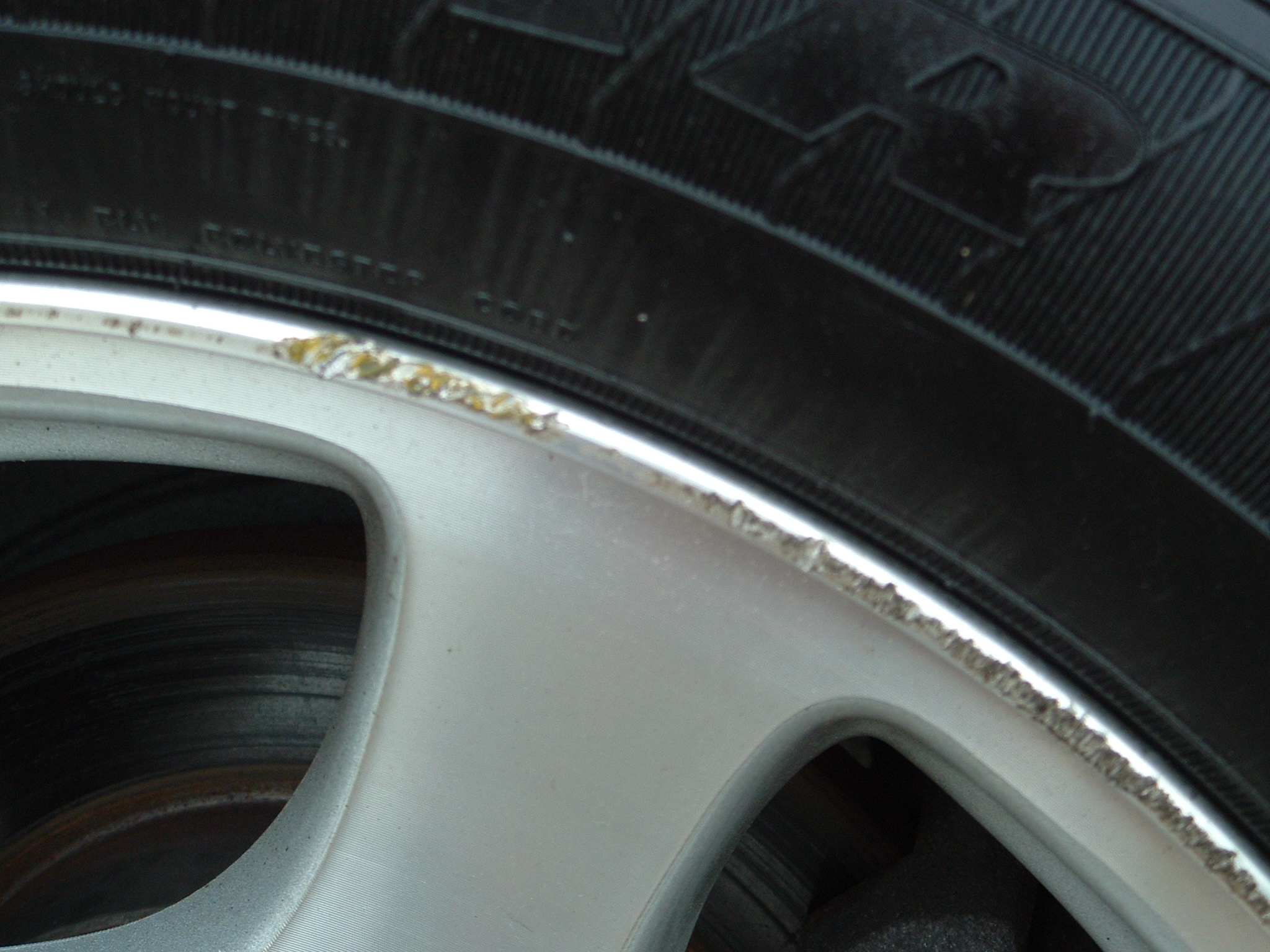 Curb Damage and Refinishing Repair Service - The Rim Doctor